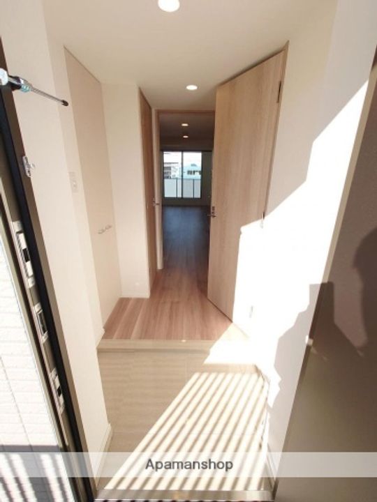 クオリタス大島の玄関