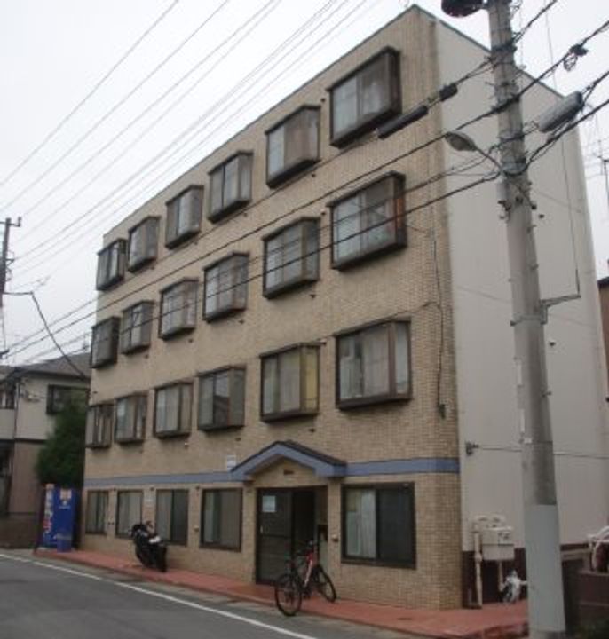 Mマンション208号室の外観