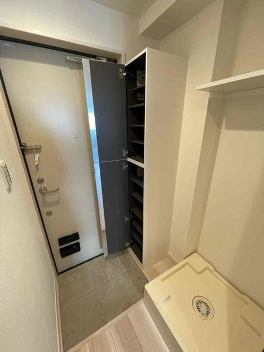 エクセラン仲六郷の玄関