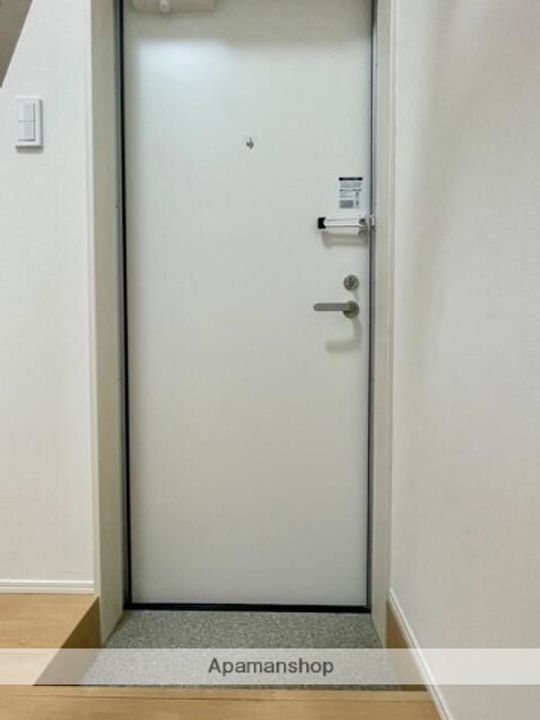 ハイツ多摩川 B号棟102の玄関