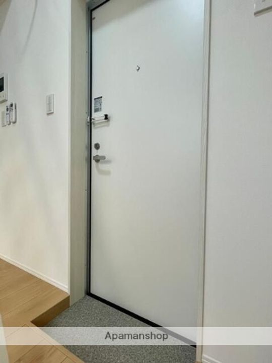 ハイツ多摩川 B号棟105の玄関