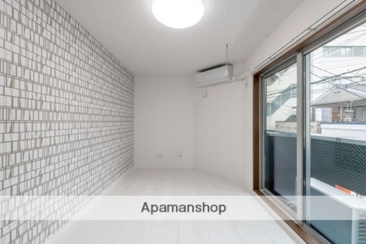 東京都荒川区西日暮里5丁目の賃貸マンションの居間