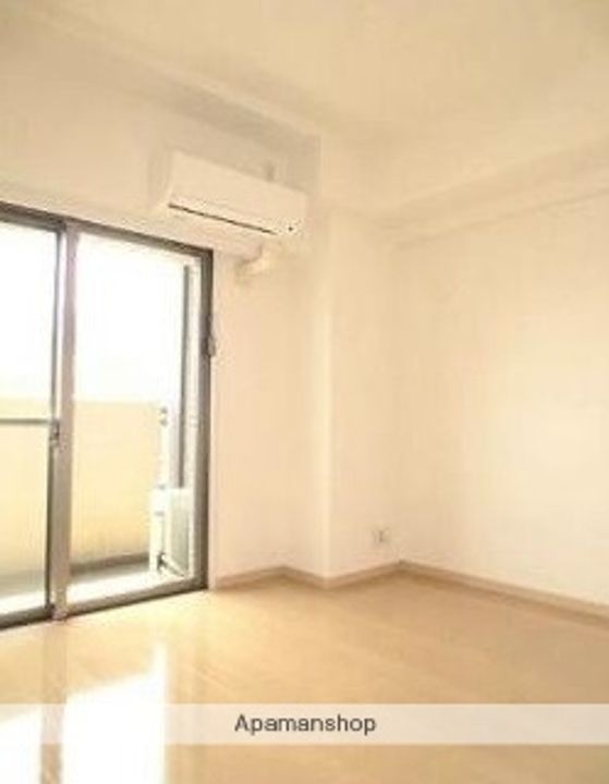 東京都中央区月島3丁目の賃貸マンションの居間