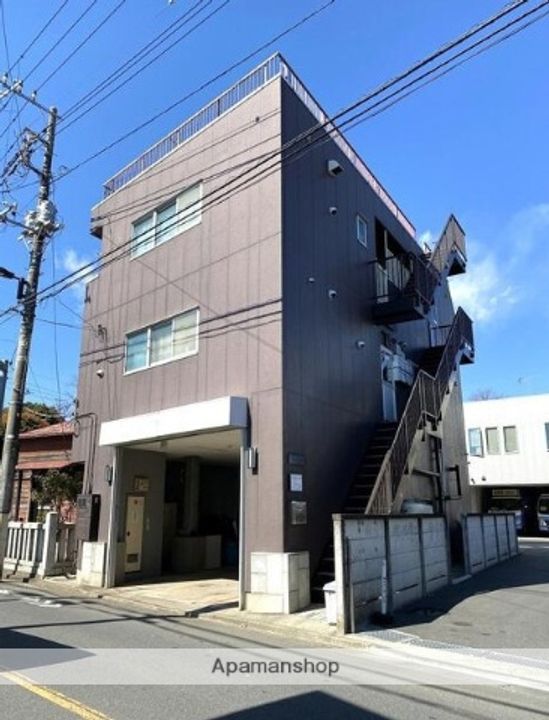 東京都三鷹市大沢3丁目の賃貸マンションの外観