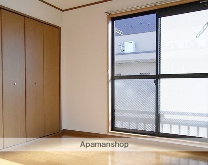 東京都三鷹市井口3丁目の賃貸アパートの居間