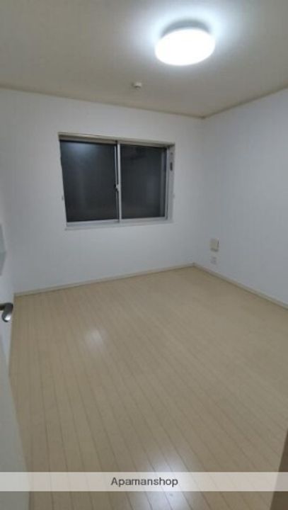 東京都足立区足立2丁目の賃貸アパートの居間