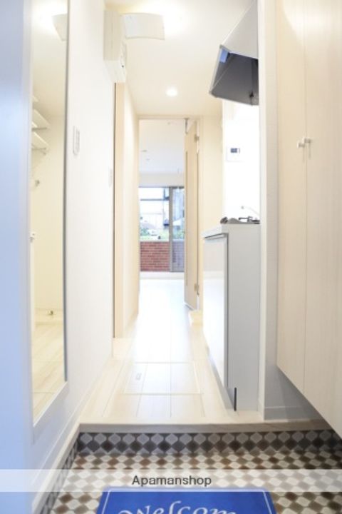 東京都調布市上石原1丁目の賃貸アパート301の玄関
