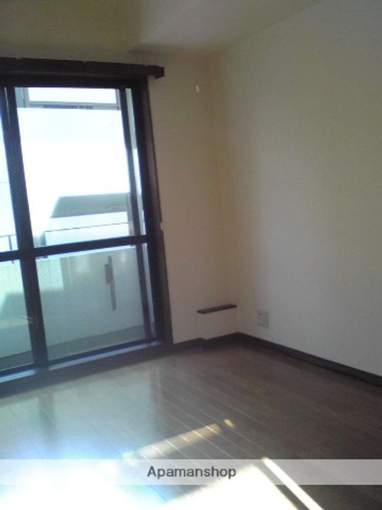 東京都調布市多摩川3丁目の賃貸マンション106の居間