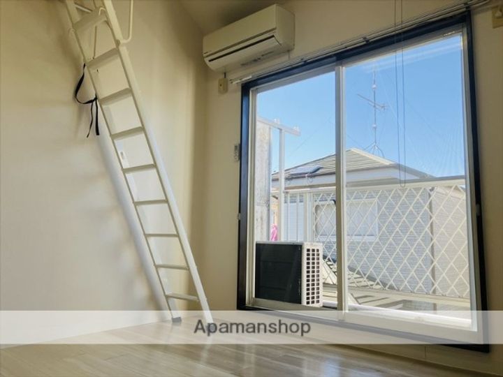 ハートピア相原203の居間