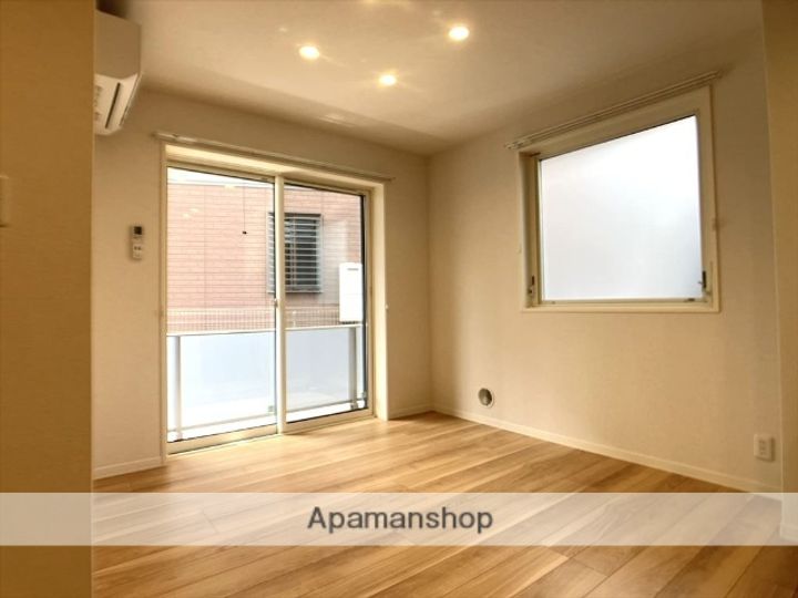 神奈川県相模原市中央区相模原2丁目の賃貸マンションの居間