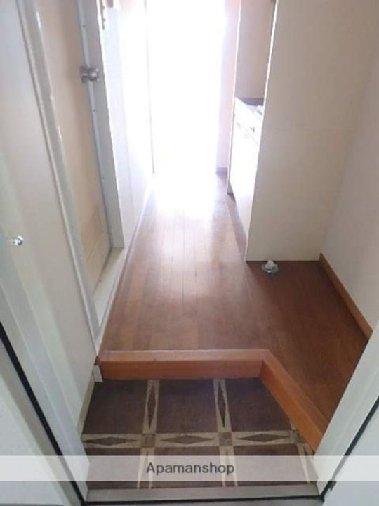グリーンハイツ麻生(孝友第6ビル)305の玄関