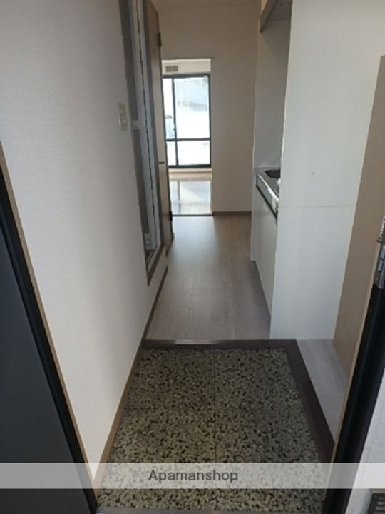 プレジオ塚越101の玄関