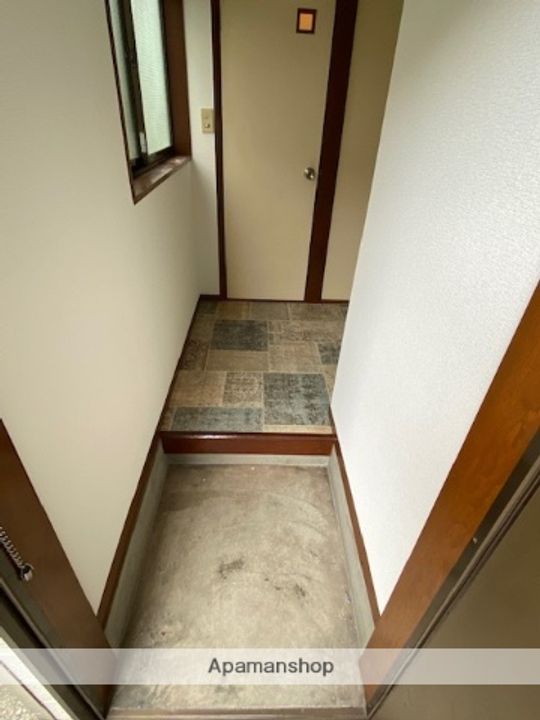 ハイツオモダカ201の玄関