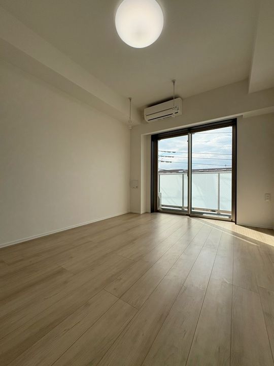 神奈川県川崎市中原区下小田中4丁目の賃貸マンションの居間