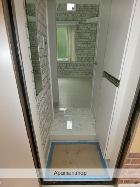 ユナイト三春台バルケッタミーアの玄関