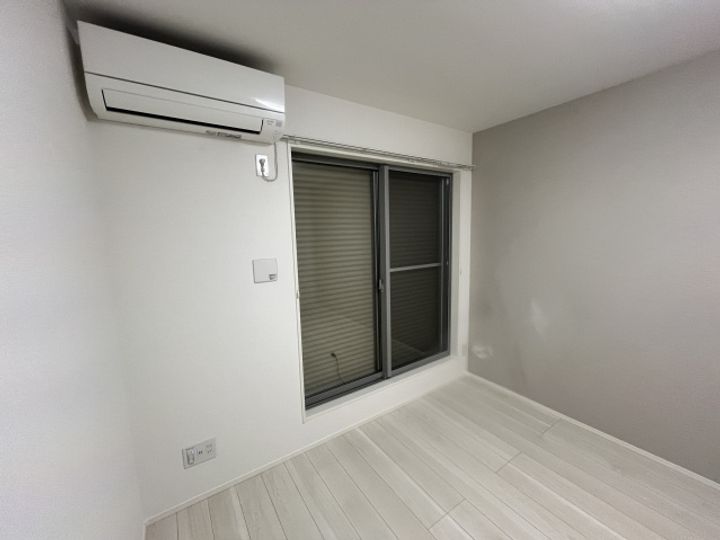 カインドネス相模が丘205号室の居間