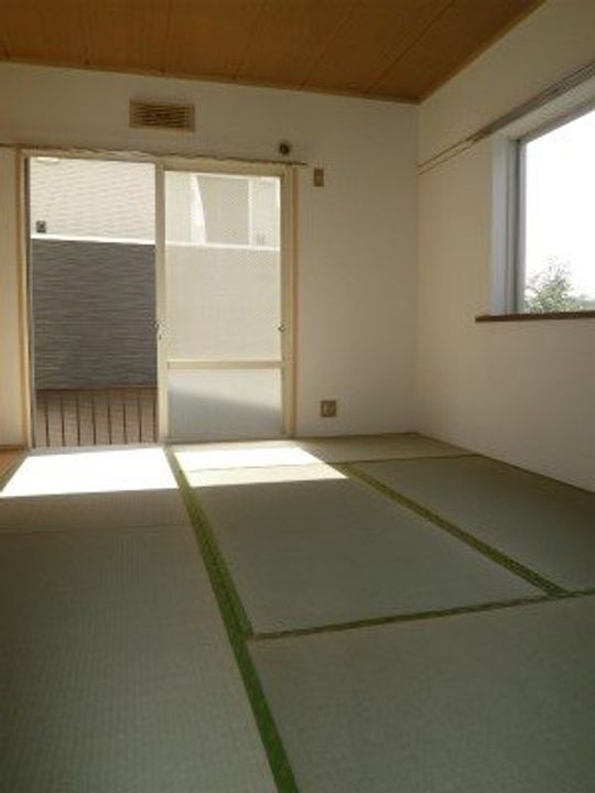 神奈川県川崎市高津区下作延6丁目の賃貸アパートの居間