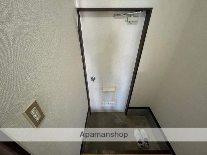 クロノス南矢名1番館202の玄関