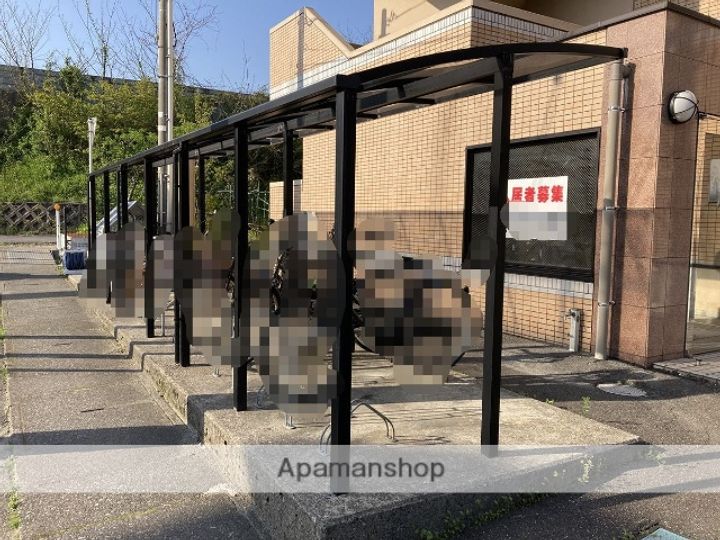 サンヘルメス尾山206の外観