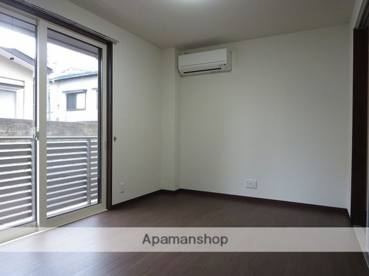 アーバン上大川前103の居間