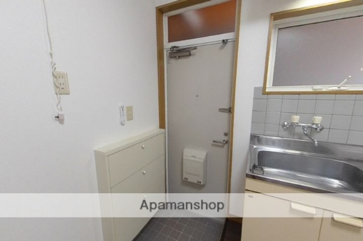 ガーデニアガーデン103の玄関