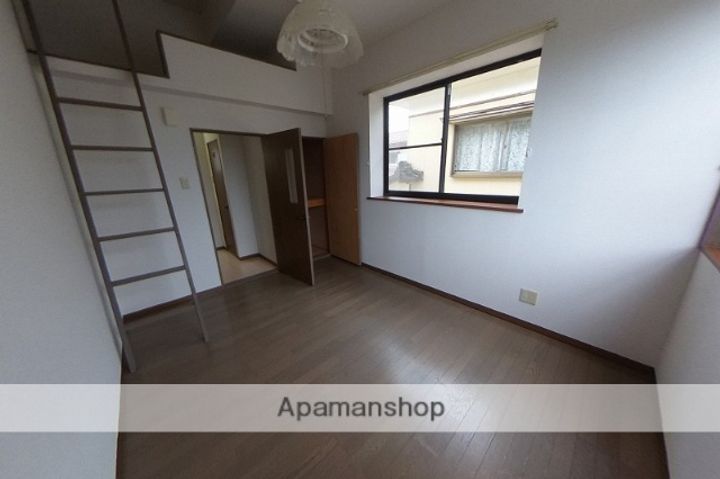 シーサイドヒルズ真砂202の居間