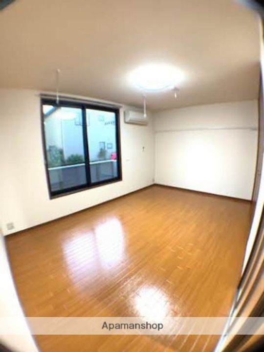 メゾンドトーエーAの居間