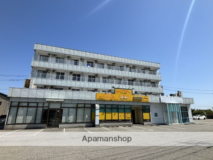 富山県高岡市佐野の賃貸マンションの外観