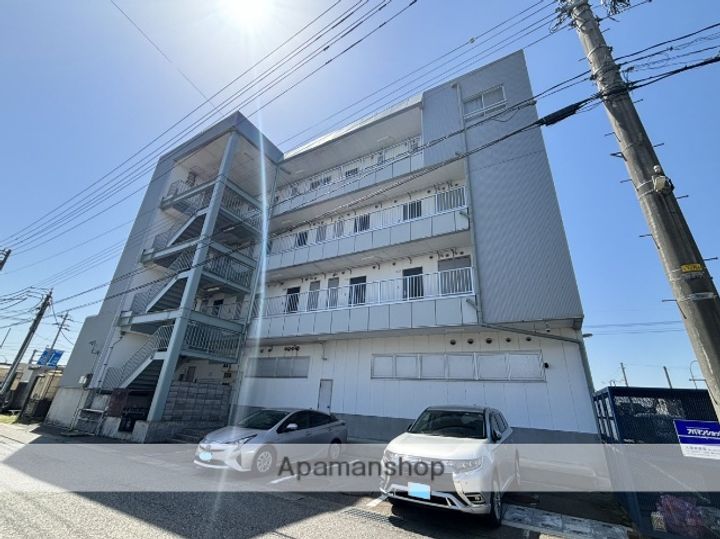 富山県高岡市佐野の賃貸マンションの外観