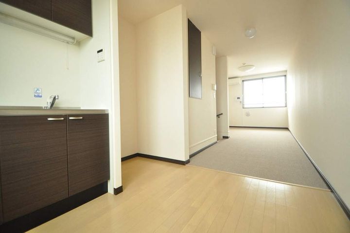 レオネクストグリーンパーク姫野106の居間