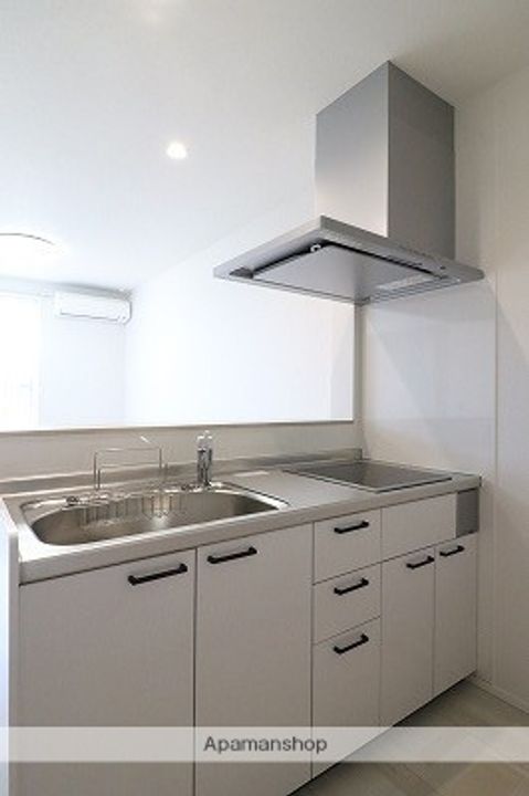 富山県砺波市杉木の賃貸アパート103のキッチン