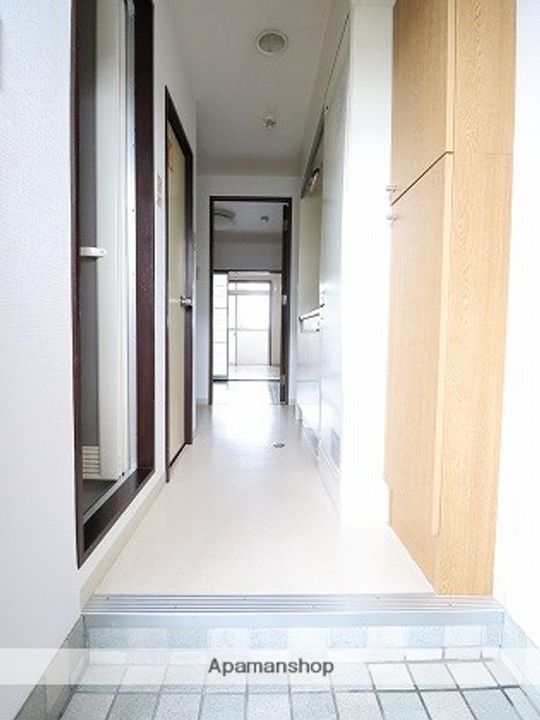 富山県富山市今泉の賃貸マンションの玄関