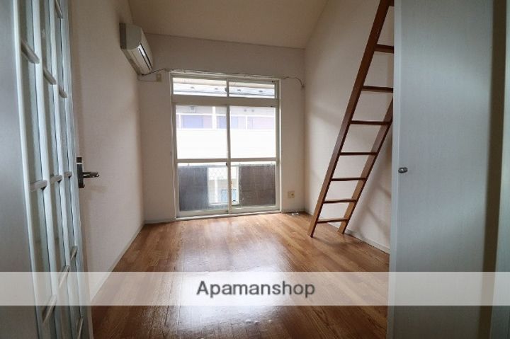 富山県富山市茶屋町の賃貸アパートの居間