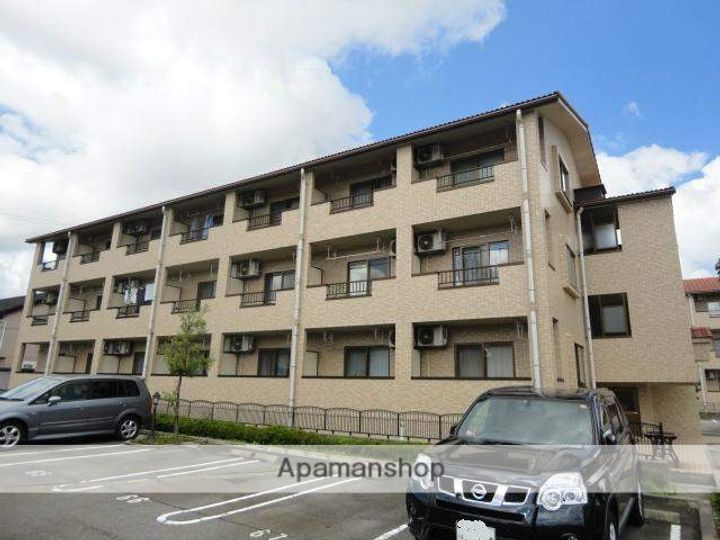 富山県富山市婦中町下轡田の賃貸マンションの外観