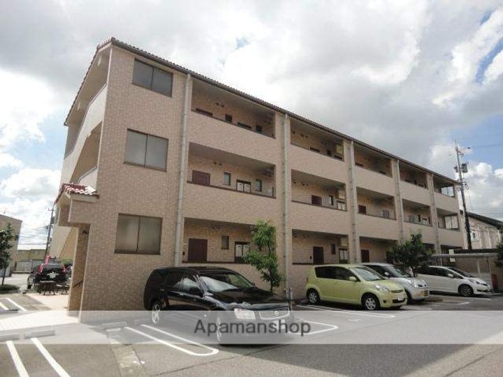 富山県富山市婦中町下轡田の賃貸マンションの外観
