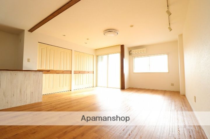 富山県高岡市蓮花寺の賃貸マンション310の居間