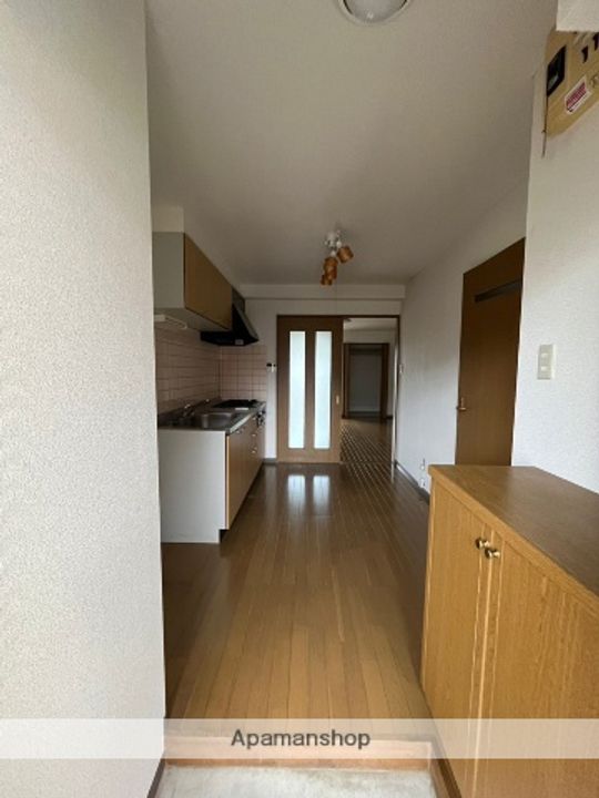 富山県富山市婦中町速星の賃貸マンションの玄関