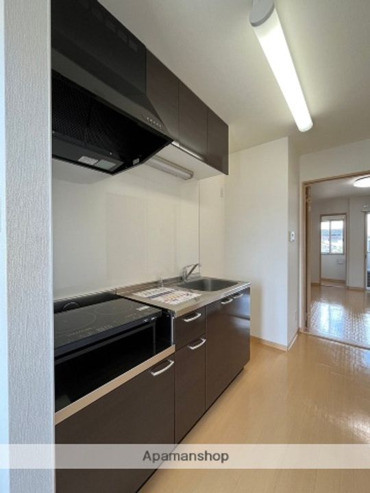 富山県富山市婦中町下轡田の賃貸マンションの内装