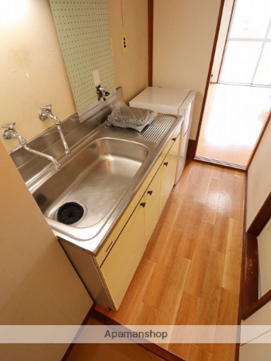 富山県富山市安養坊の賃貸マンションのキッチン