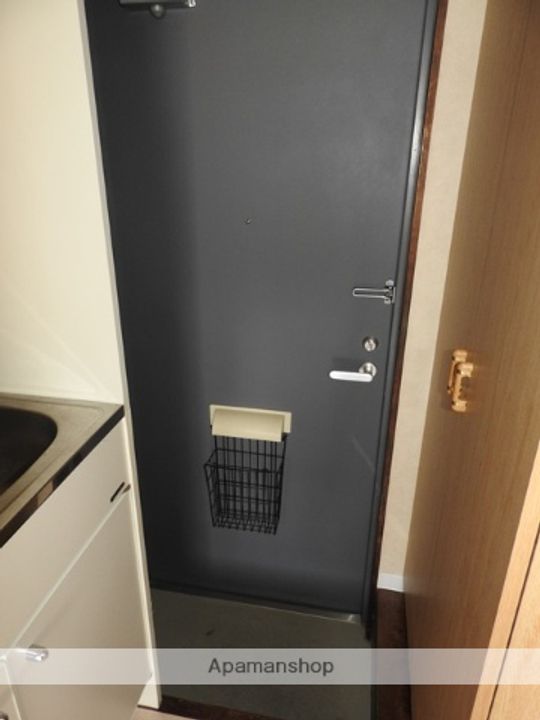 イーストアベニュー高校前102の玄関