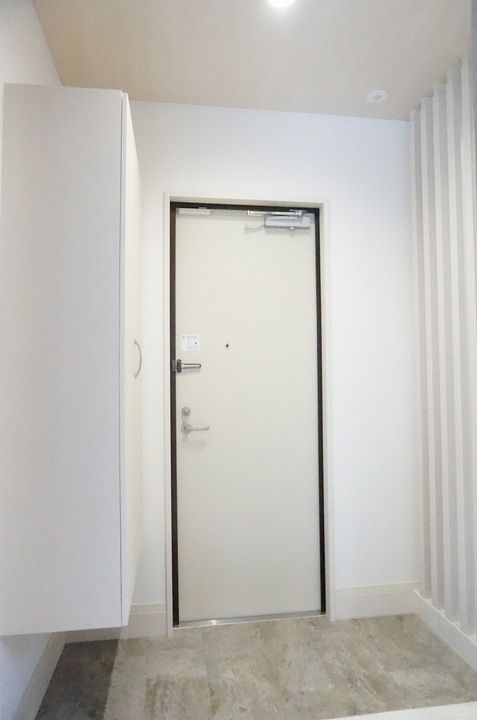 グランカーサ十三間町の玄関