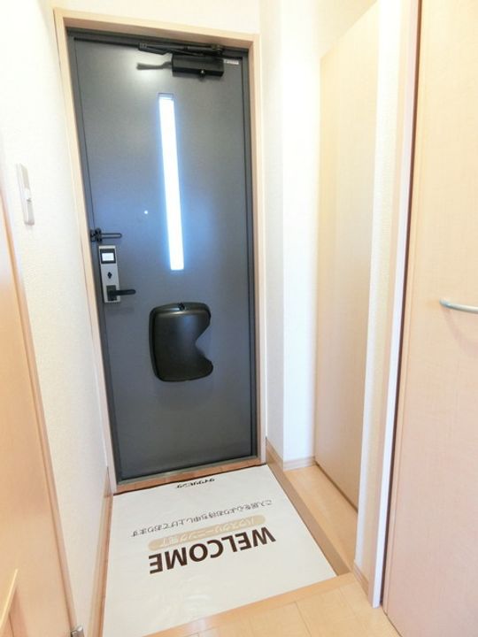 リジョンロード加茂川の玄関