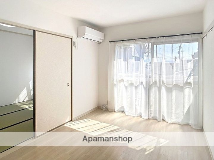 タウンアベニュー小泉ABA202の居間