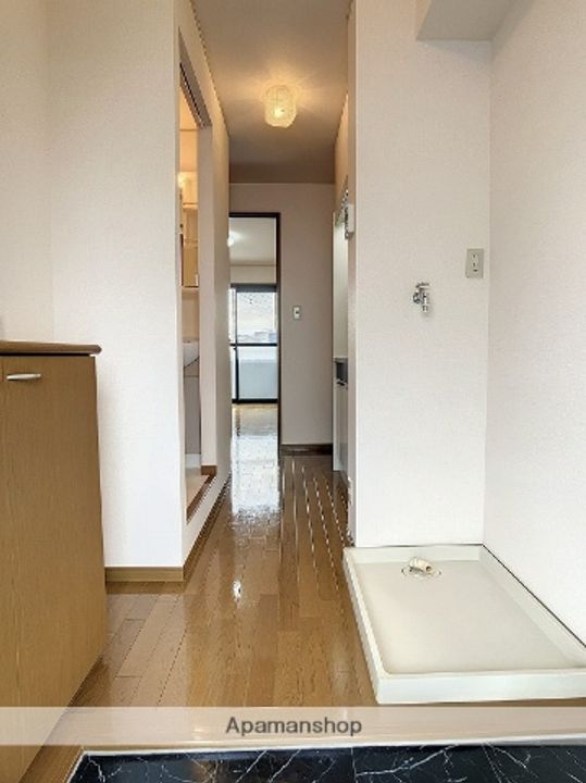 コーラル三園202の玄関