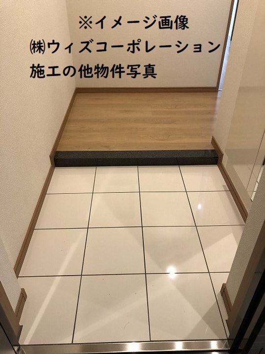 プラドスメゾン伝法207の玄関