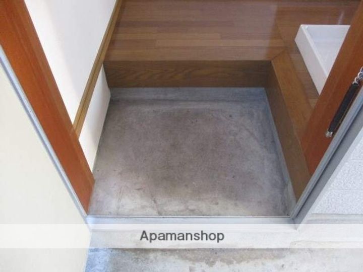 コーポ星ヶ丘103号室の玄関