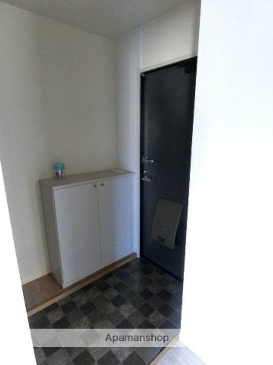 オーシャンヒルズA201の玄関