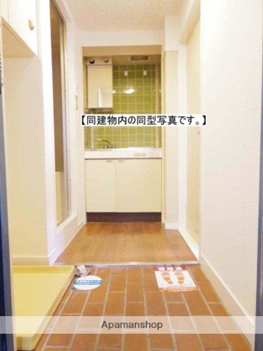 カレッジタウンウィング117の玄関