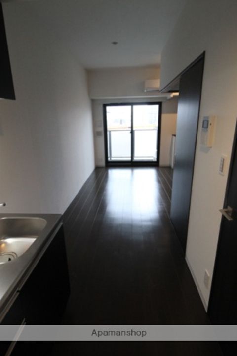 愛知県名古屋市中川区高畑4丁目の賃貸マンションの居間