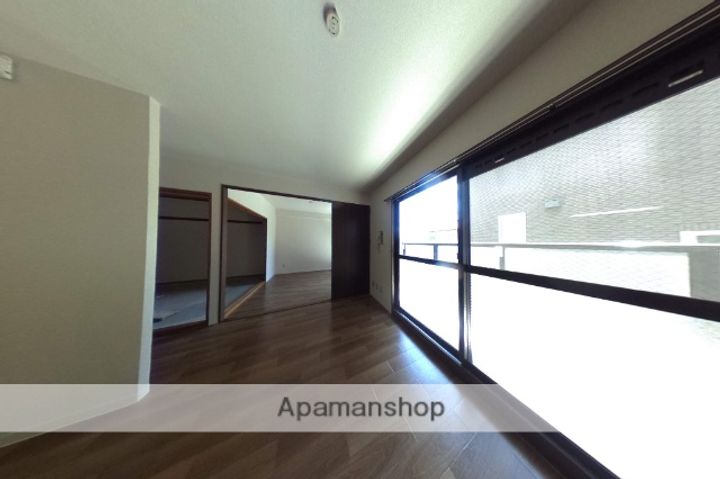 愛知県小牧市久保新町の賃貸マンション203の居間